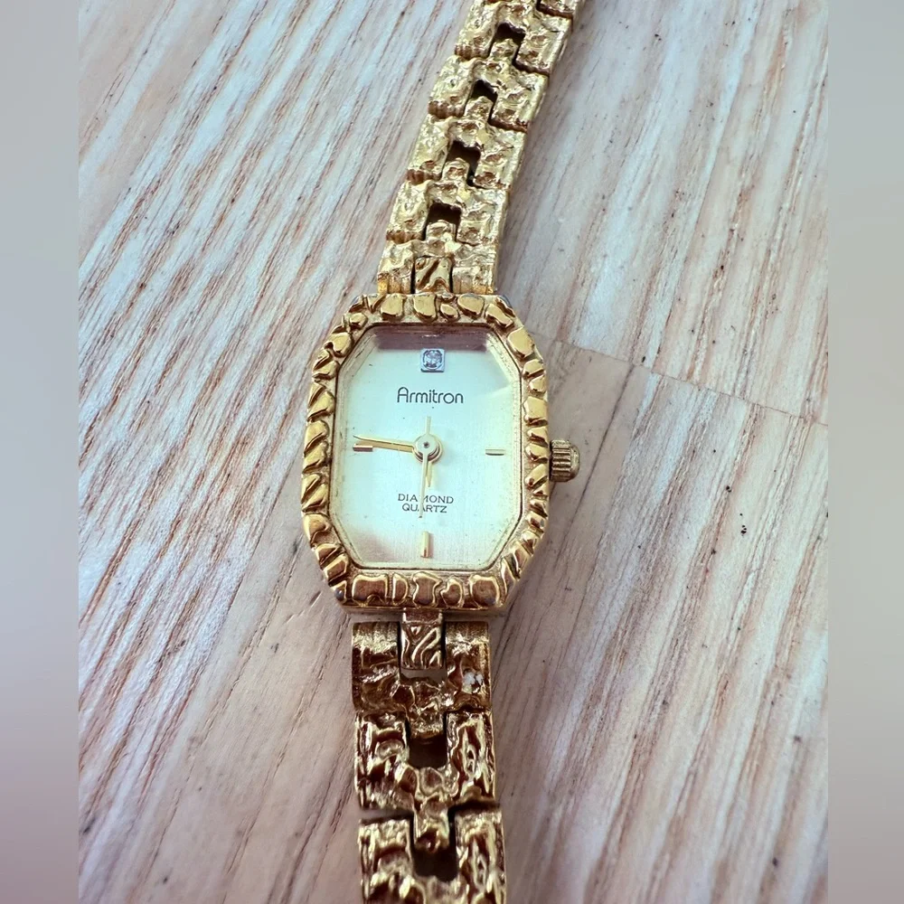Armitron ladies octagonal gold tone diamond dress watch NEW BATTERY